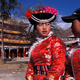 Two Mosuo women visit the Buddhist temple in Yongning, China (Christopher Pillitz/Getty Images)